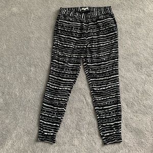 Black VANS joggers with white stripes